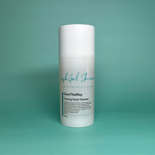 Foaming facial cleanser bottle with 'LashGal Skincare' branding on a teal background