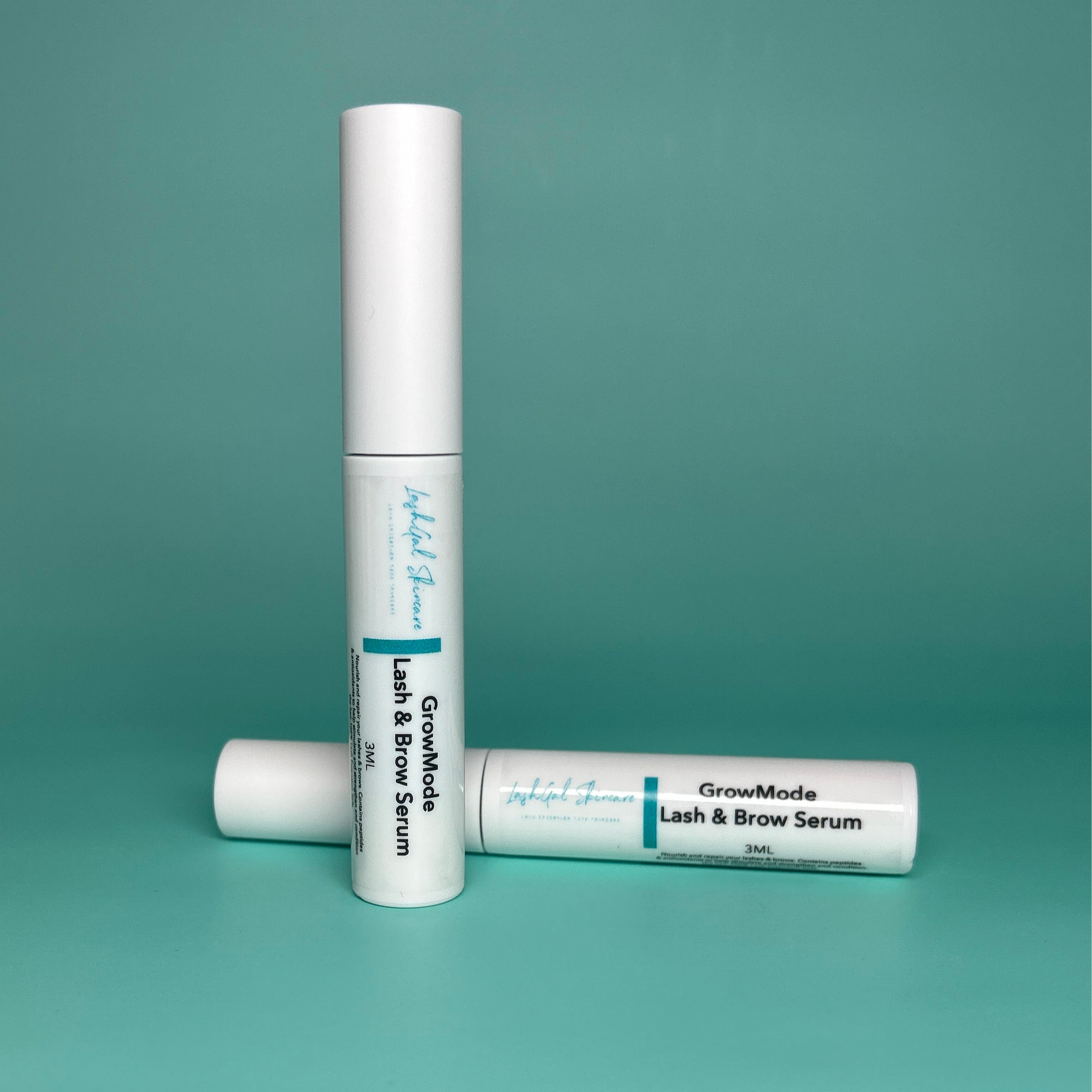 lashgal skincare, Two bottles of GrowMode Lash & Brow Serum on a teal background