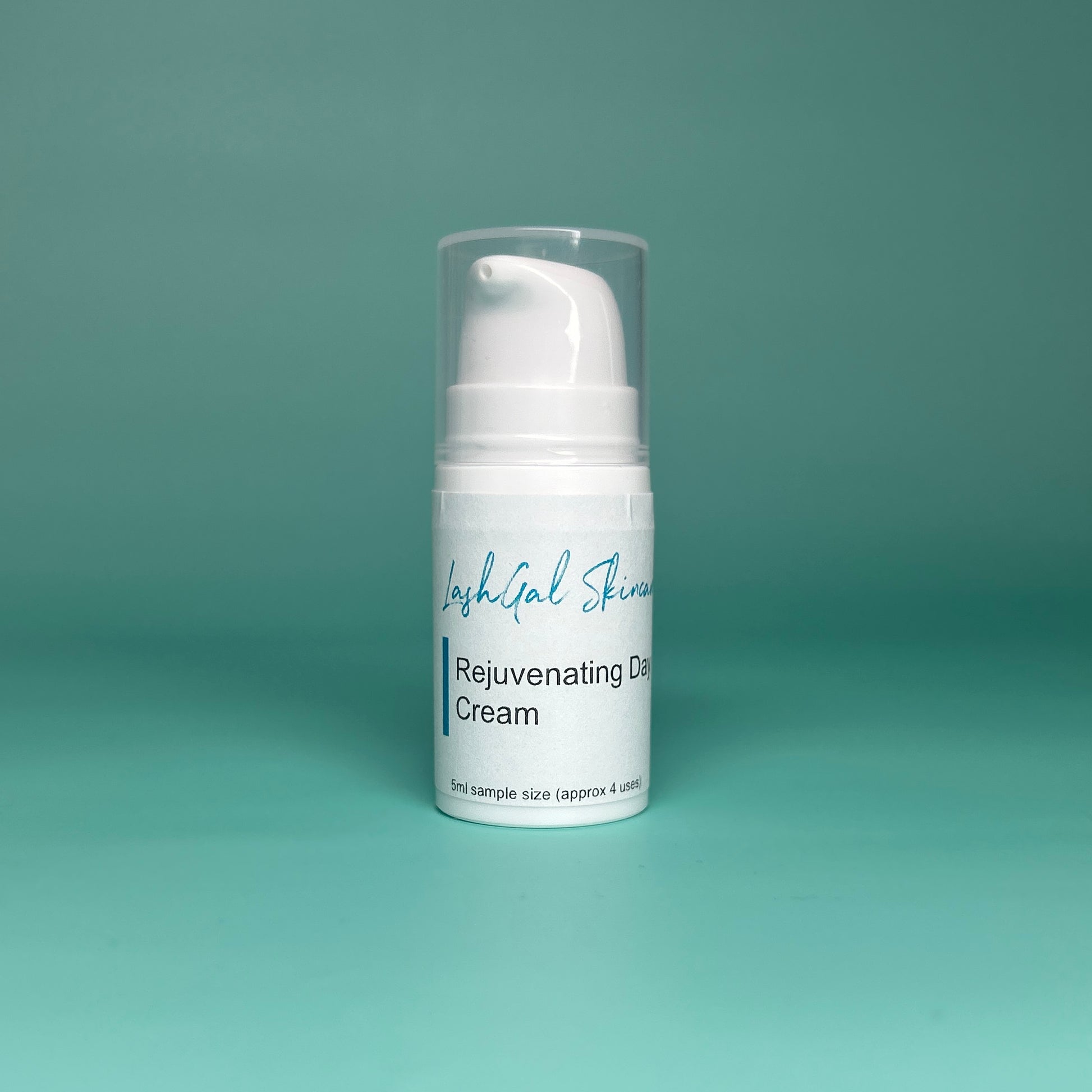 sample size Skincare cream bottle labeled 'Rejuvenating Day Cream' on a teal background